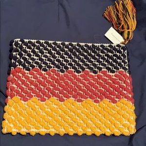 NWT Clutch, never used